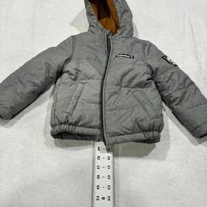 Grey Timberland kids size 4T puffer jacket with hood, warm and waterproof. SKU49